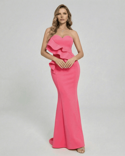Celeste Maxi Dress by Lauven featuring elegant ruffle detail in vibrant pink, perfect for special occasions.