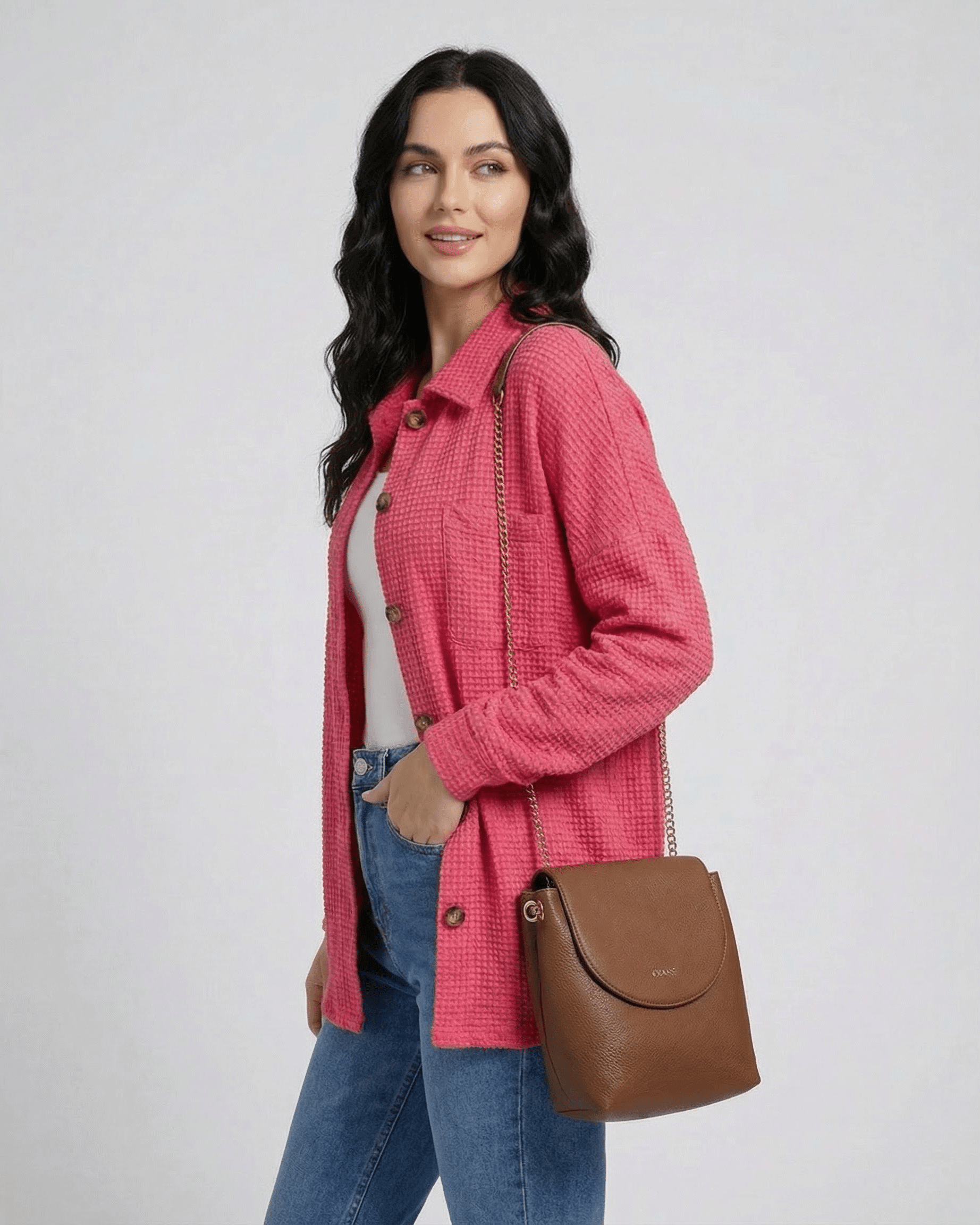Verona Jacket by Lauven worn by a woman, showcasing a pink waffle knit design and casual style.