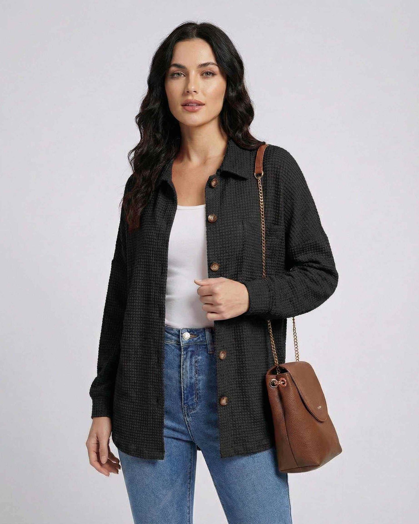 Milano Jacket by Lauven – Women's black jacket in waffle knit with longline fit and button front.