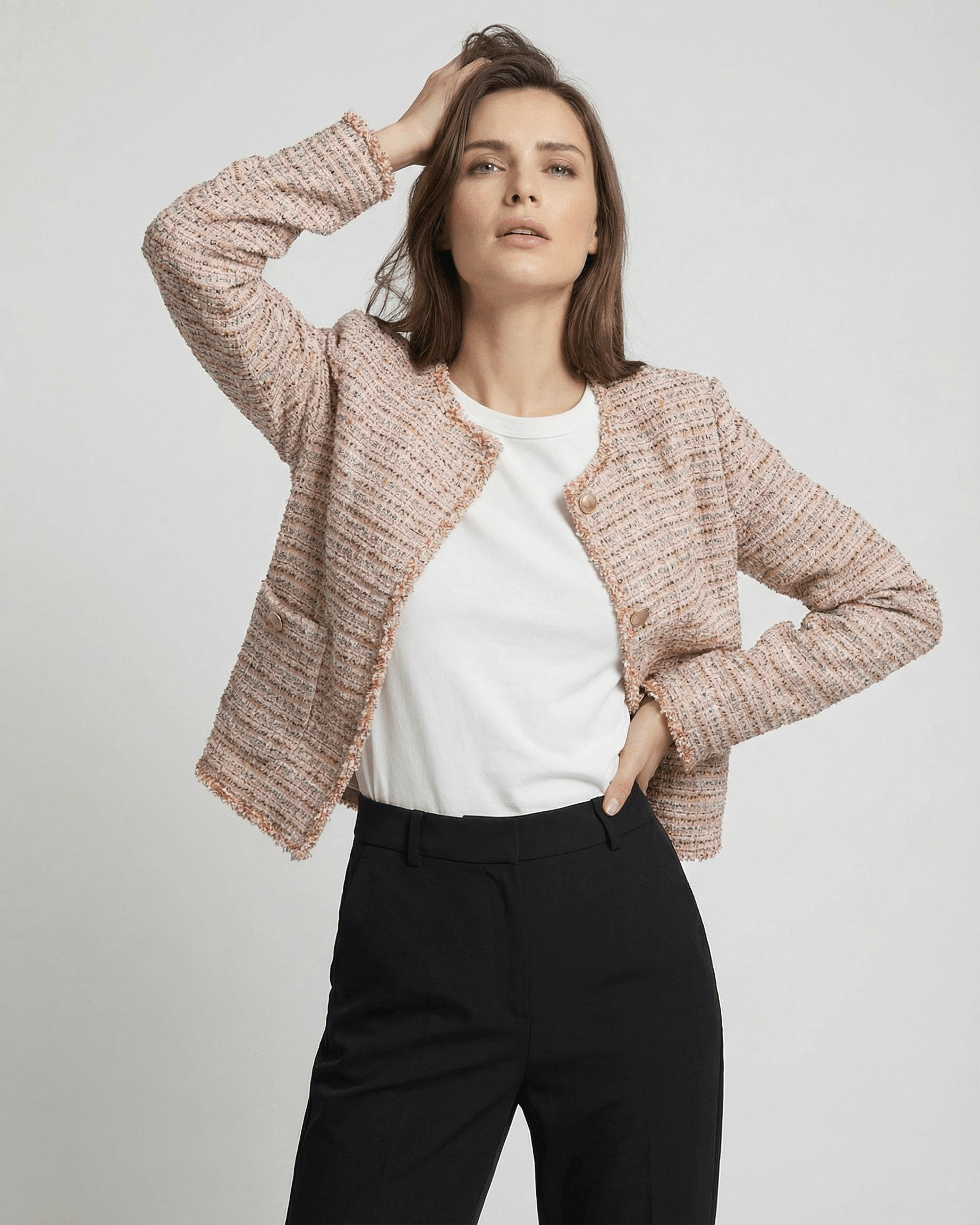 Model wearing the Florence Jacket by Lauven, a stylish women's tweed jacket in a multitone weave.
