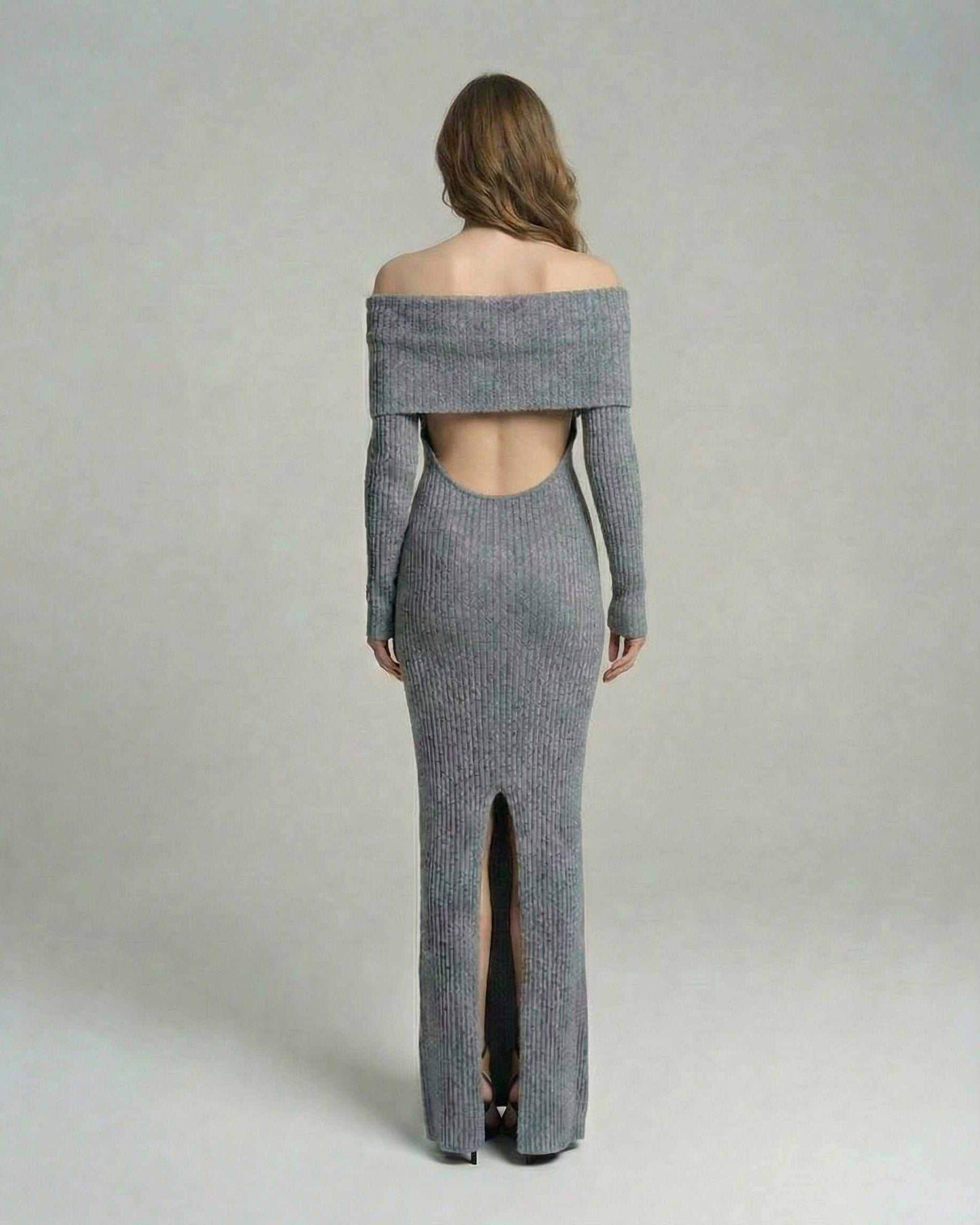 Sierra Maxi Dress by Lauven - Back view of a sleek ribbed sheath dress with off-shoulder neckline and side slit.