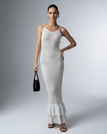 Lauven Pearl Maxi Dress in white, featuring a hollow out bodycon design and elegant silhouette.