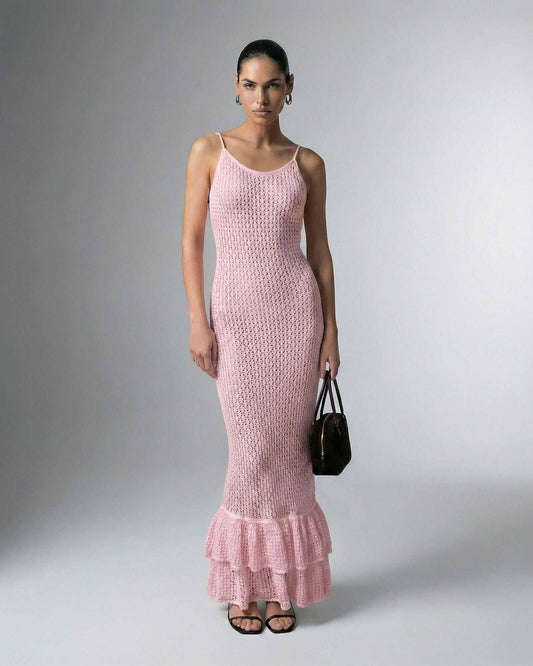 Rosaline Maxi Dress by Lauven – Pink bodycon dress with hollow out knit texture and ruffled hem.