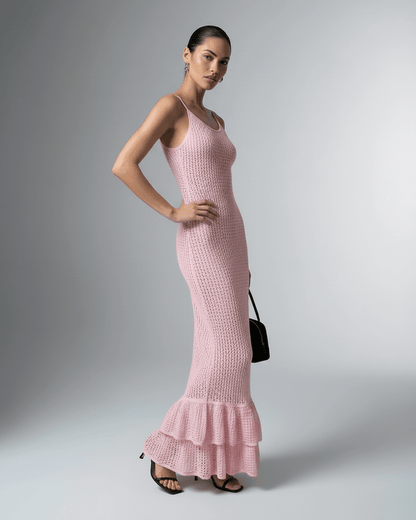Rosaline Maxi Dress by Lauven – Pink bodycon maxi dress with hollow out knit texture and flared hem.