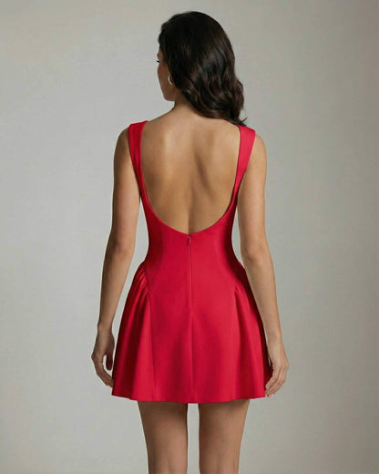 Sorrento Mini Dress by Lauven, red A-line mini dress with high waist and ruffle detail, back view.