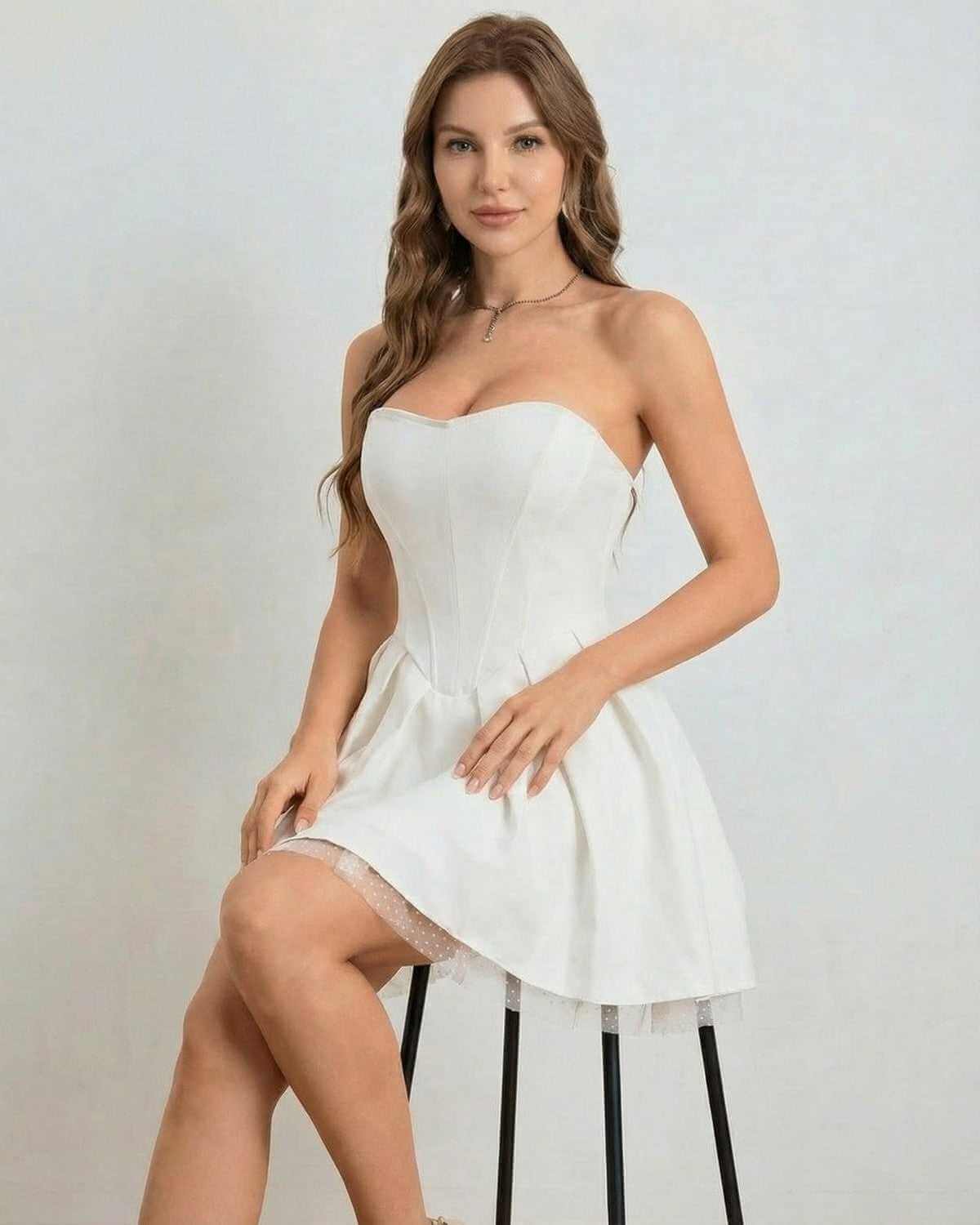 Ivoria Mini Dress by SLIMONA - Strapless high-waist white mini dress with soft volume and elegant finish.