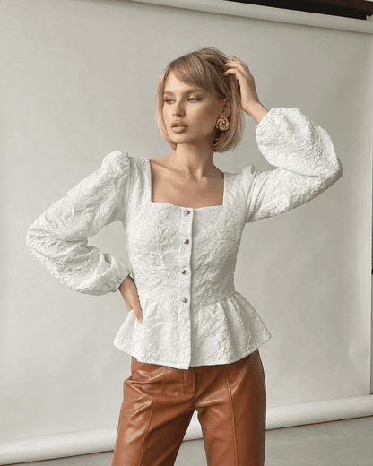Ivory Corset Top by SLIMONA - Elegant square neck puff sleeve blouse in structured jacquard fabric.