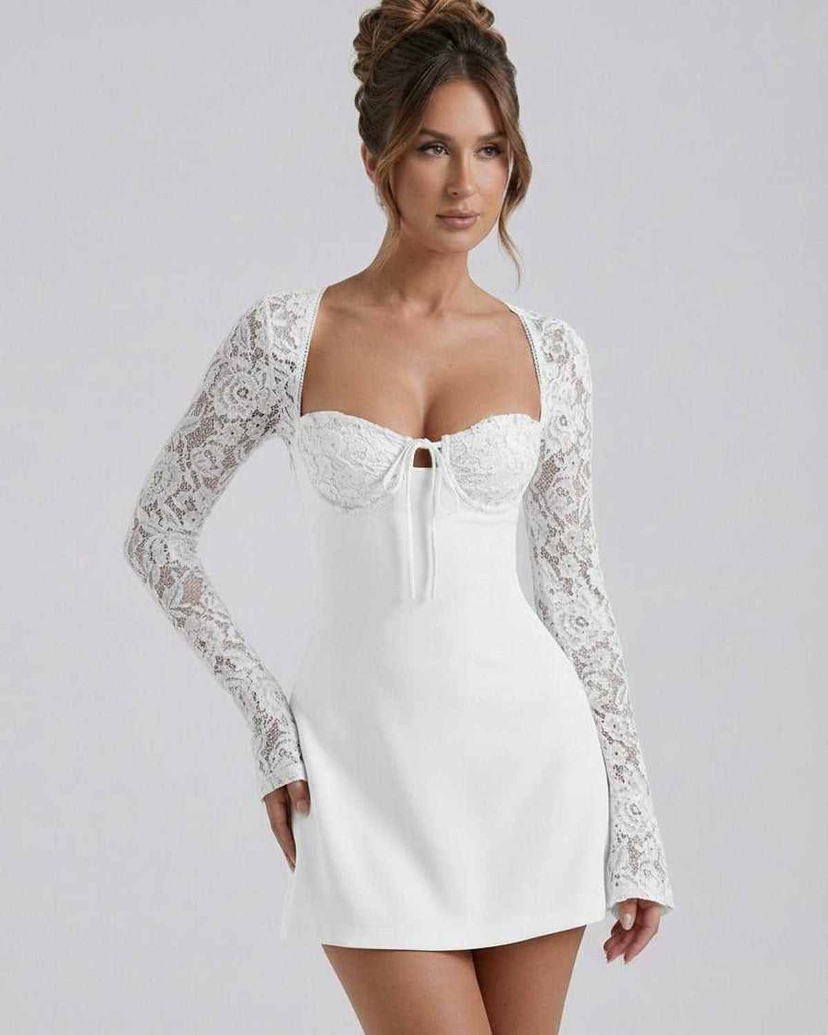 Ivory Lace Dress by Lauven featuring floral lace sleeves and fitted mini silhouette.