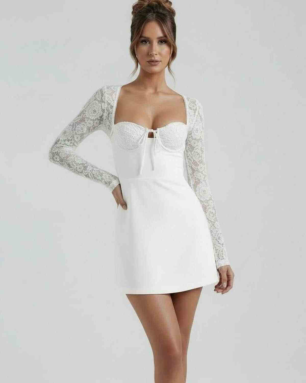 Ivory Lace Dress by Lauven, elegant white lace sleeve mini dress with fitted shape and floral lace detailing.