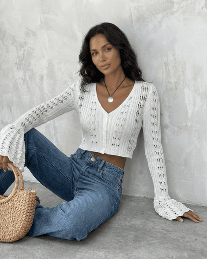 Laceflare Cardigan by SLIMONA, elegant white cotton knitwear with flare sleeves and V-neckline.