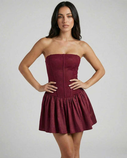Asteria Mini Dress by SLIMONA, a burgundy strapless corset mini dress with flared skirt and fairy silhouette.