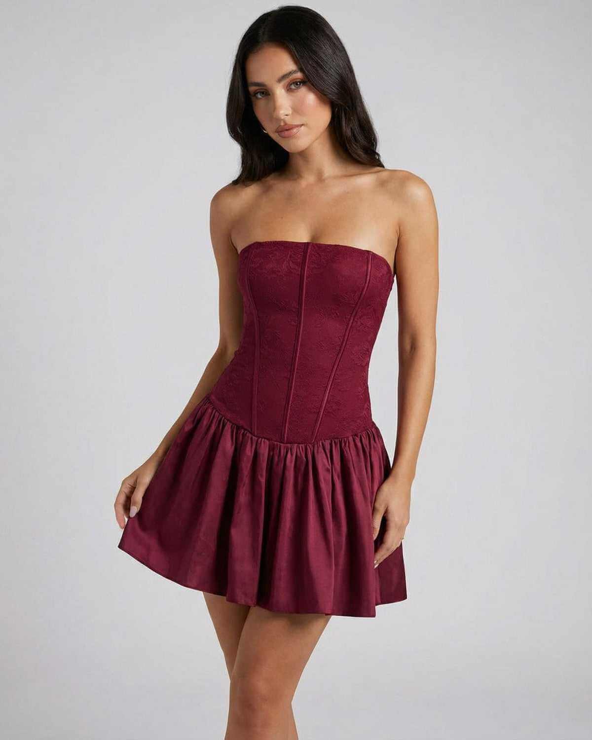 Asteria Mini Dress by SLIMONA - Strapless corset mini dress in burgundy with a flared skirt, perfect for elegant occasions.