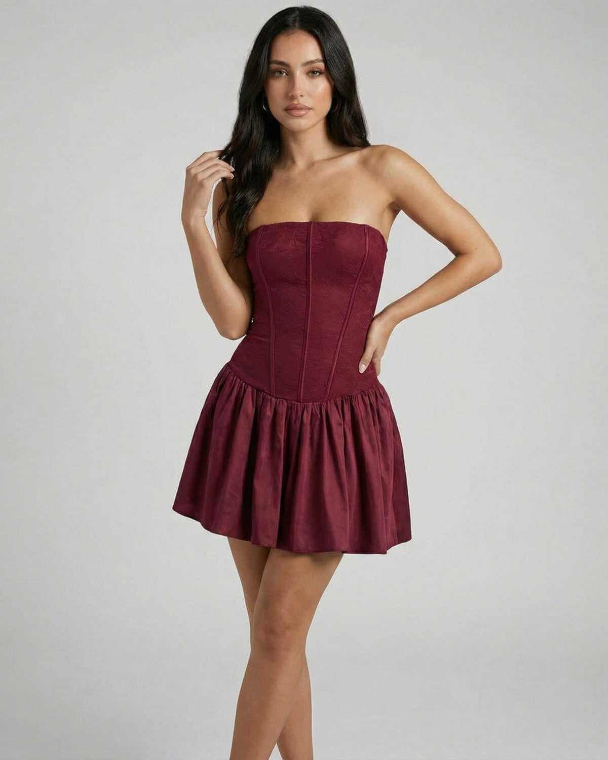 Asteria Mini Dress by SLIMONA, strapless corset mini dress in burgundy with flared skirt.