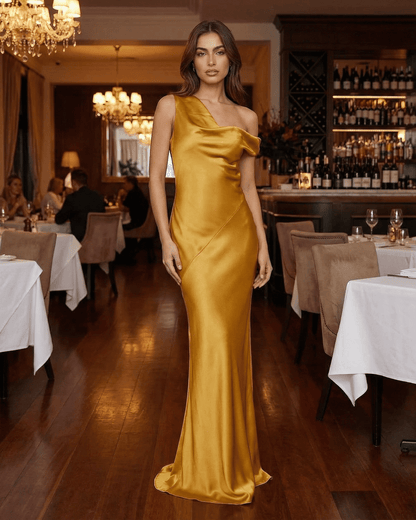 Aurelia Maxi Dress by SLIMONA, elegant gold satin dress featuring a high waist and open back, perfect for special occasions.