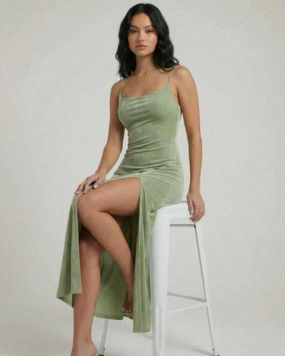 Aurelia Midi Dress by Lauven featuring a square neck, slim fit, and asymmetrical slit in a soft green color.