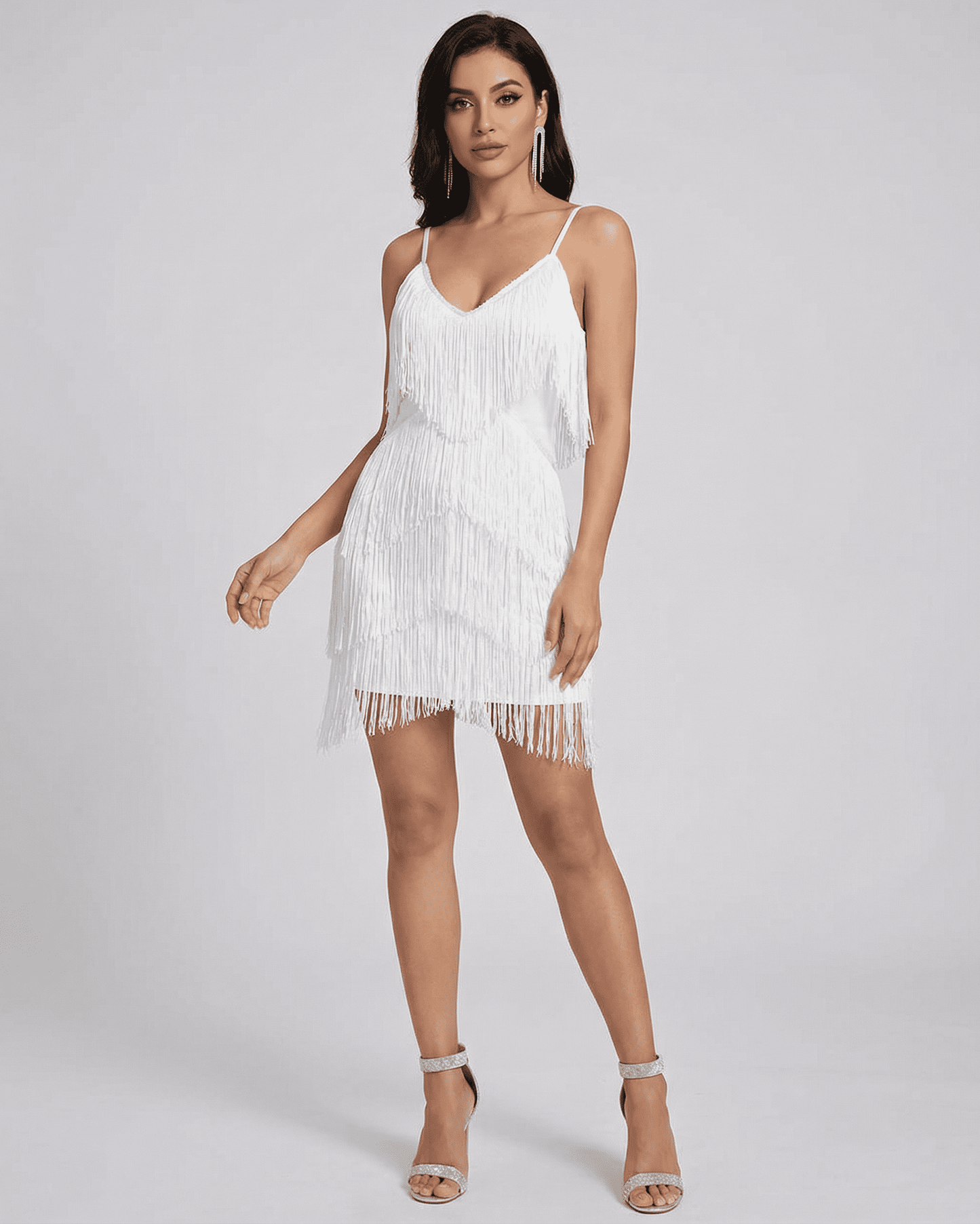 Aurora Mini Dress by SLIMONA, featuring fringe detailing and a V-neck silhouette, perfect for elegant summer outings.
