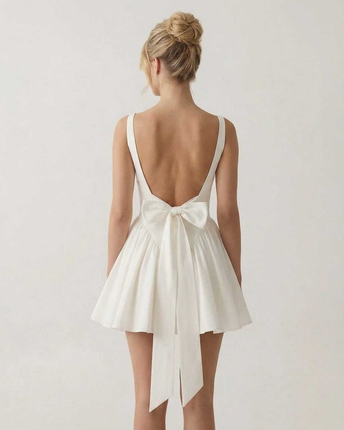 Aurora Mini Dress by SLIMONA - Square Neck Backless Mini Dress with Bow Detail in white, showcasing a chic A-line silhouette.