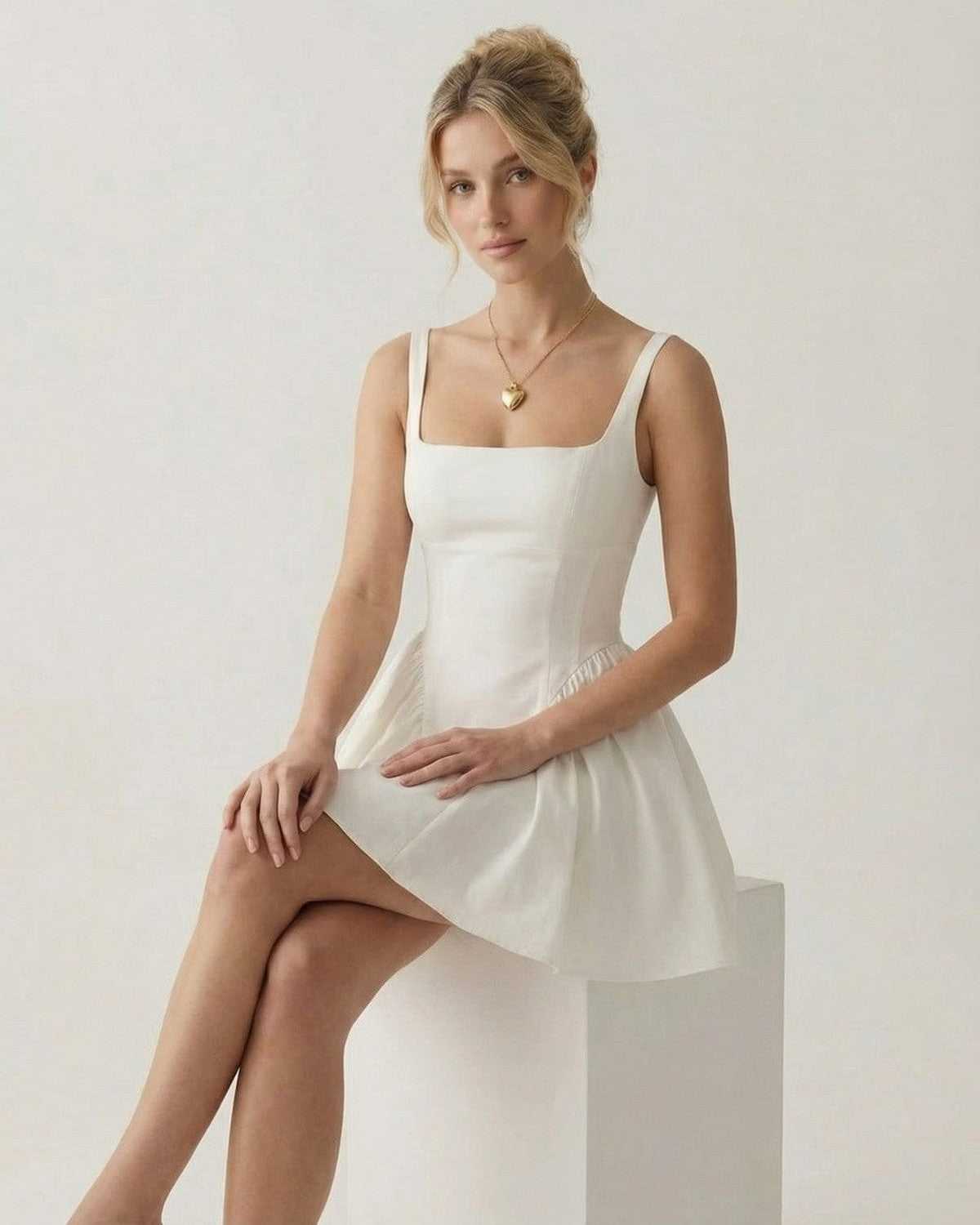Aurora Mini Dress by SLIMONA - Square Neck Backless Mini Dress with Bow Detail in white.