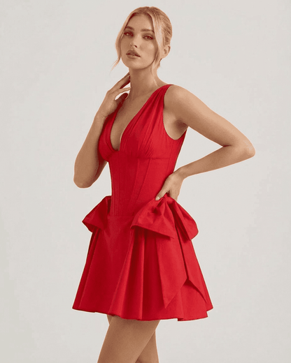 Aurora Mini Dress by SLIMONA features a V-neck corset bodice and pouf skirt in bold red, perfect for party occasions.