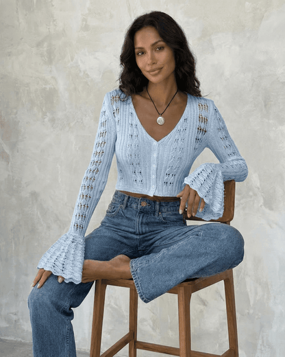 Azure Cardigan by SLIMONA – Cropped cotton knit with flare sleeves in light blue, perfect for elevating everyday fashion.