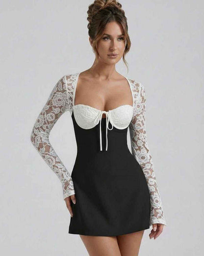 Bianca Lace Dress by Lauven - Black mini dress with white lace sleeves and floral detailing.