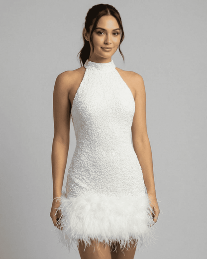 Bianca Mini Dress by SLIMONA – White sequin halter bodycon with fuzzy hem, showcasing a sleek silhouette.