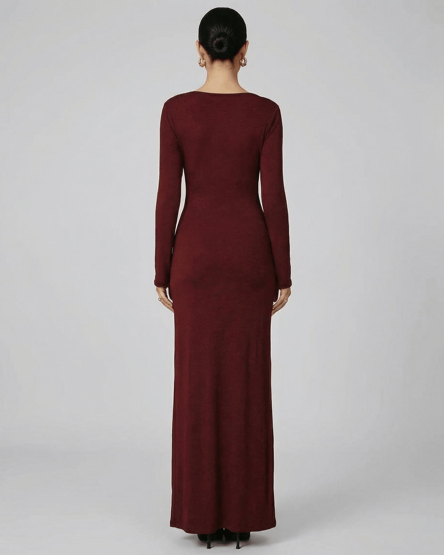 Bordeaux Maxi Dress by Lauven, showcasing a sleek back view with long sleeves and a fitted silhouette in deep wine-red.