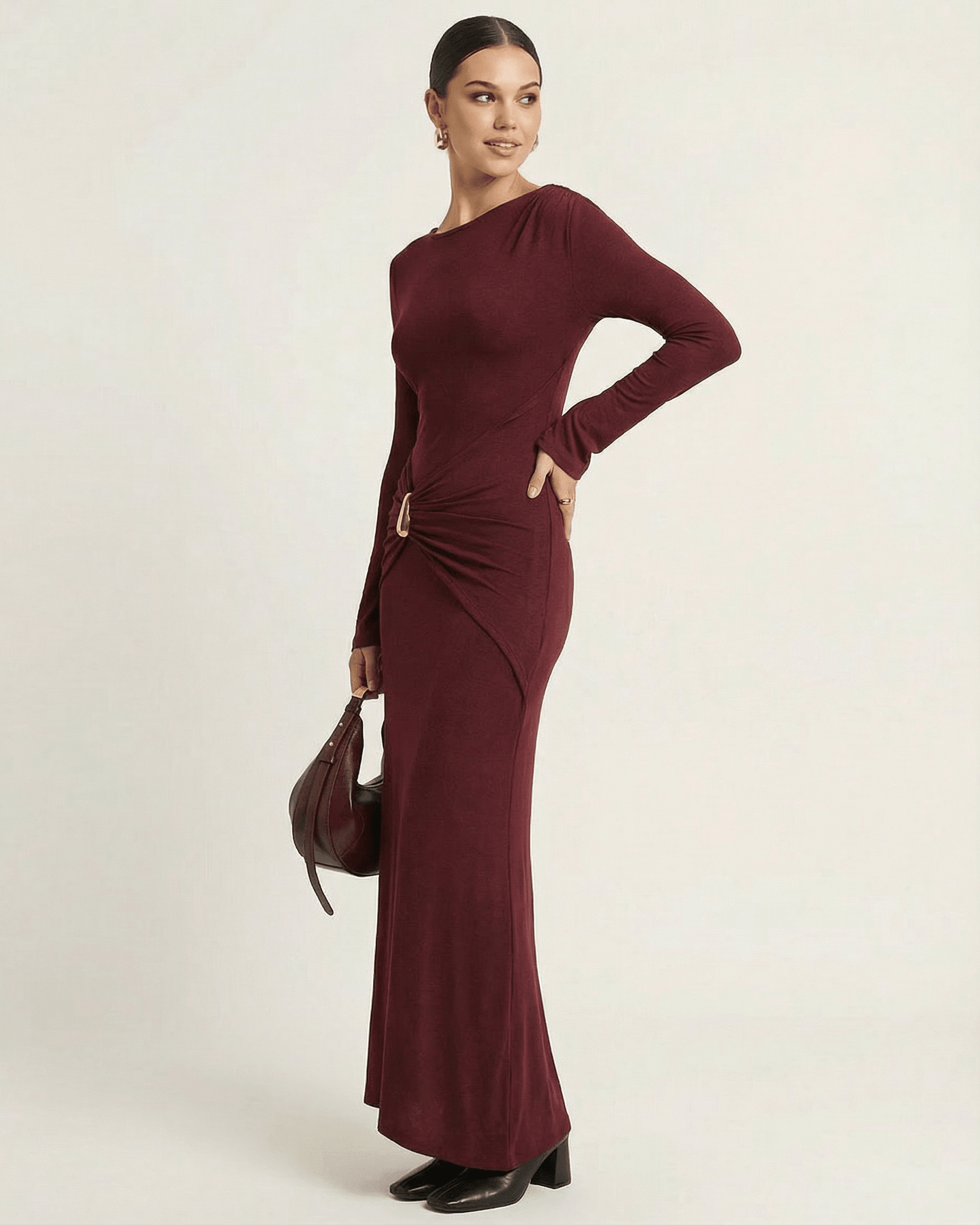 Bordeaux Maxi Dress by Lauven, showcasing a bodycon silhouette with pleated high waist and long flare sleeves.