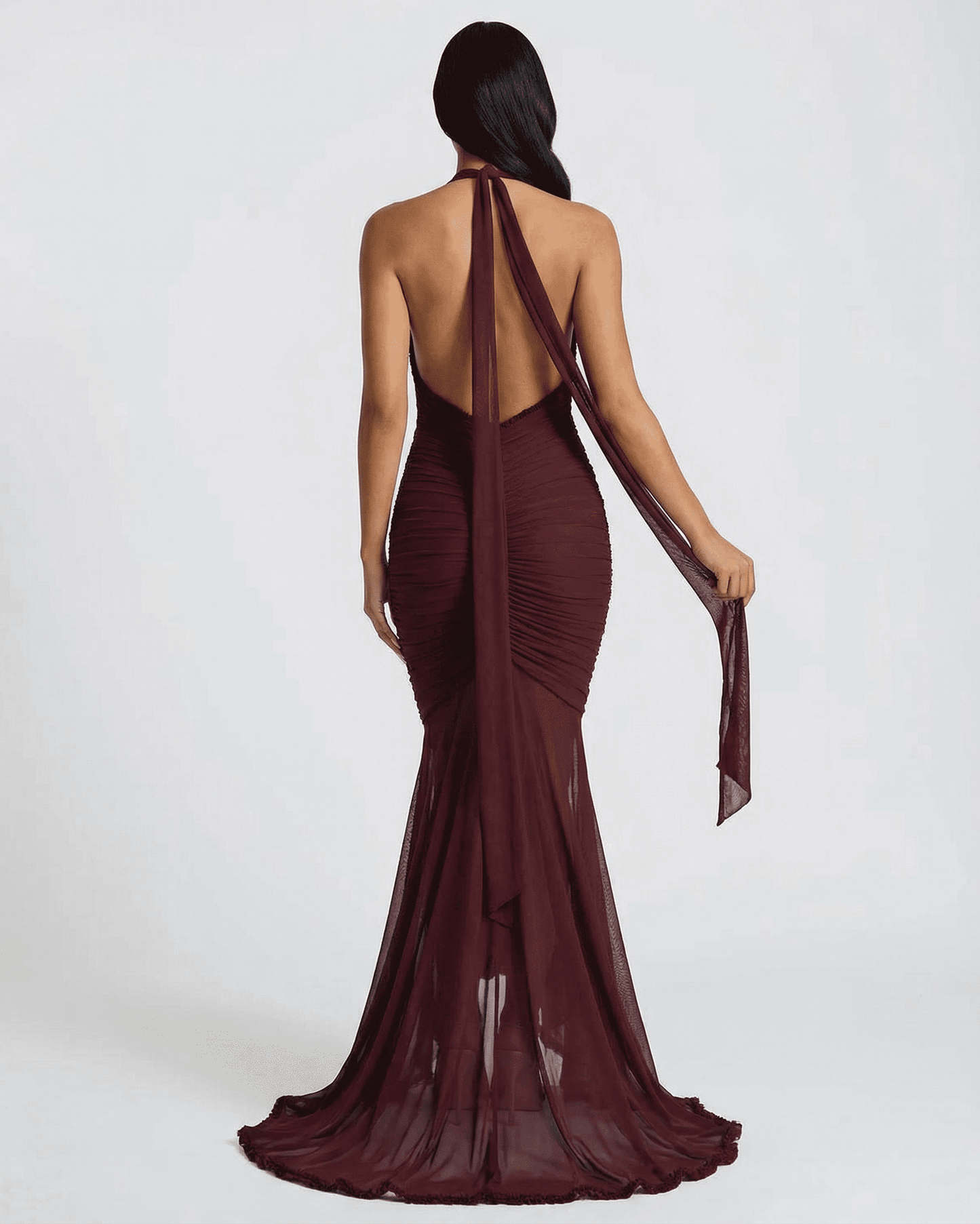 Bordeaux Maxi Dress by SLIMONA showing the elegant back view with ruched design and flowy train.