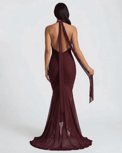 Bordeaux Maxi Dress by SLIMONA showing the elegant back view with ruched design and flowy train.