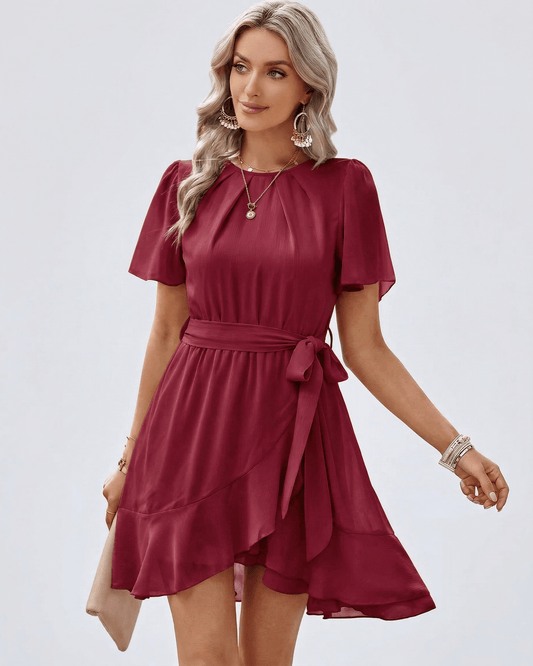 Burgundy Ruffle Dress by Lauven, featuring flutter sleeves and adjustable waist tie for a feminine silhouette.