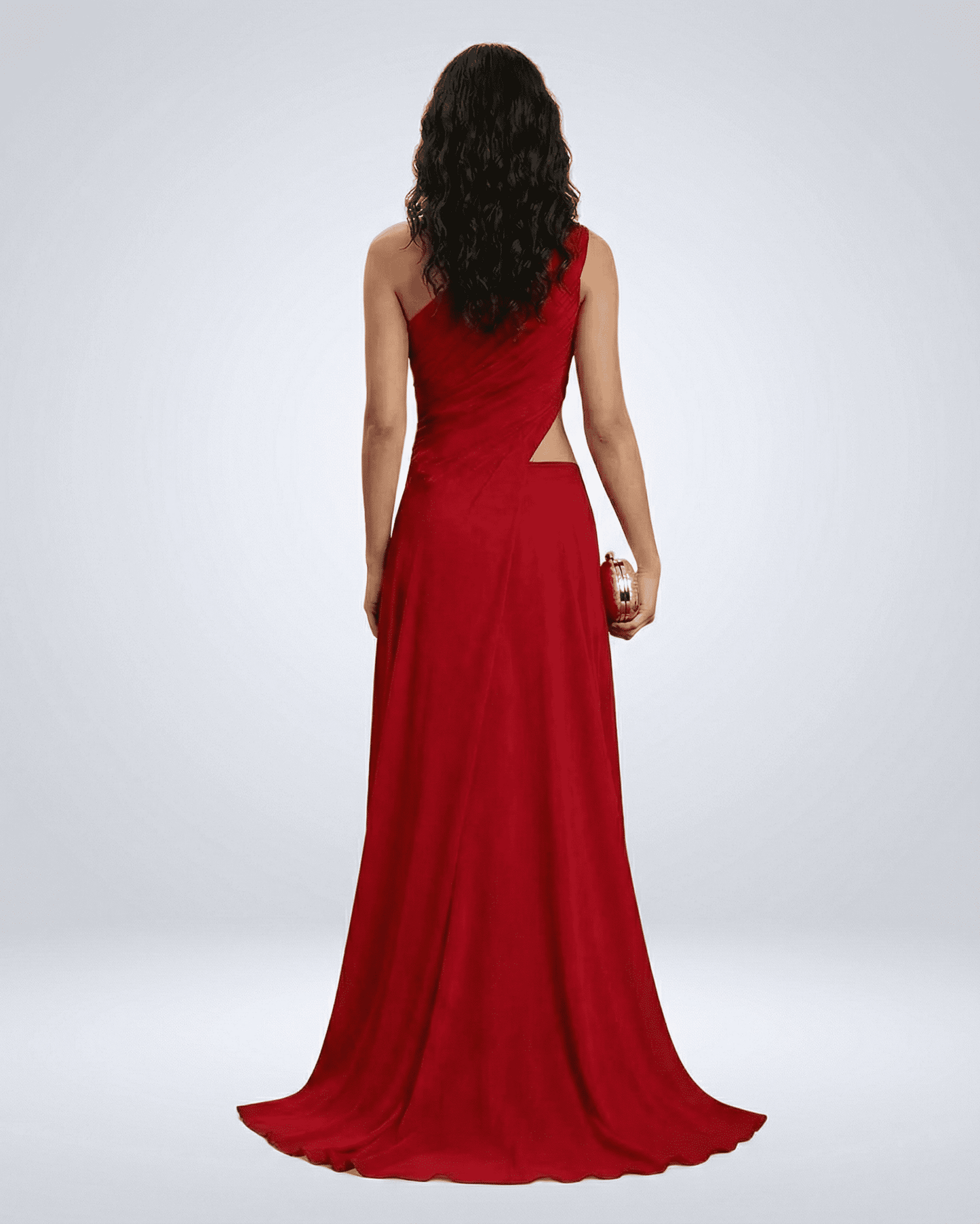 Back view of the elegant Caldera Maxi Dress by SLIMONA, showcasing the one-shoulder design and flowing silhouette.