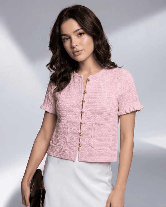 Camellia Cardigan by SLIMONA in pink, featuring short sleeves and a buttoned O-neck design for stylish everyday wear.