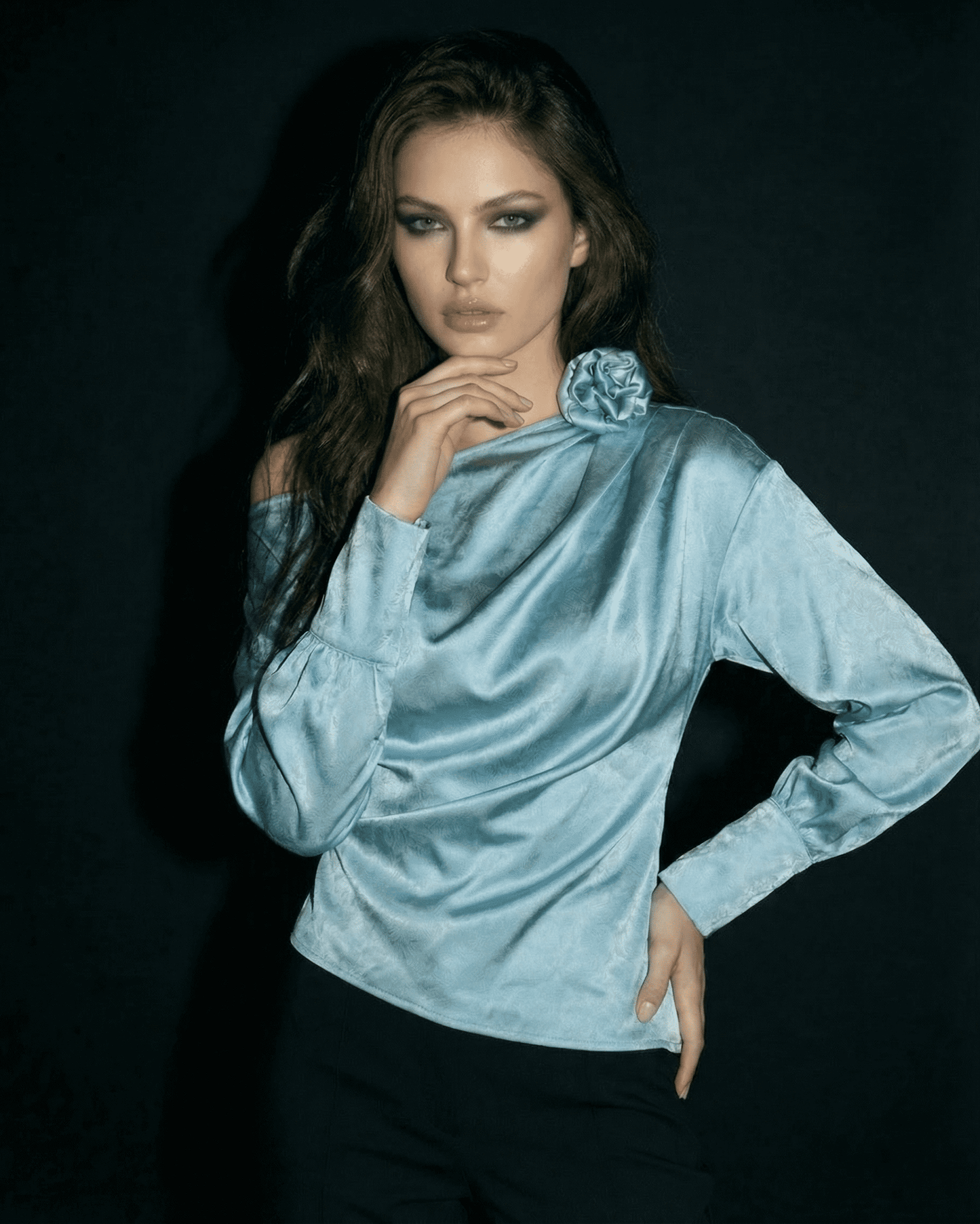 Celeste Blouse by SLIMONA, featuring asymmetrical neckline and satin-style finish, perfect statement piece.