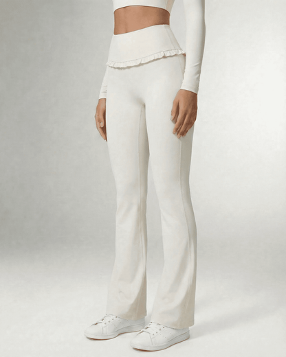 Celeste Leggings by SLIMONA, elegant white flare pants with high waist and pockets, perfect for stylish comfort.