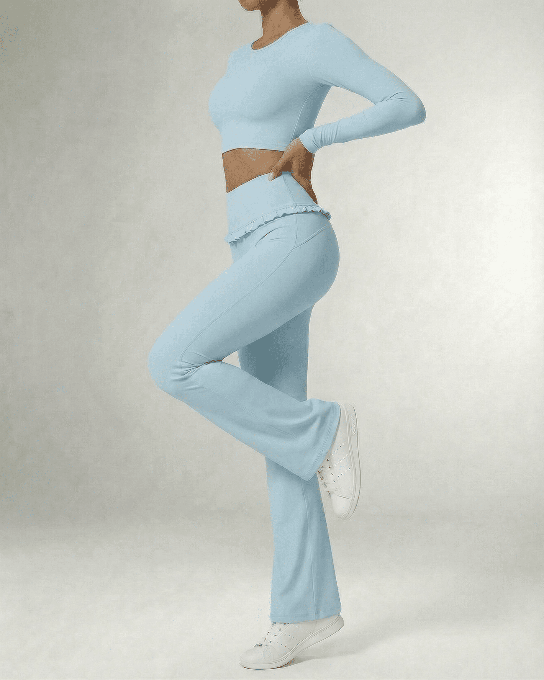 Celeste Leggings Blue from SLIMONA, stylish light blue flare pants with pockets for activewear.