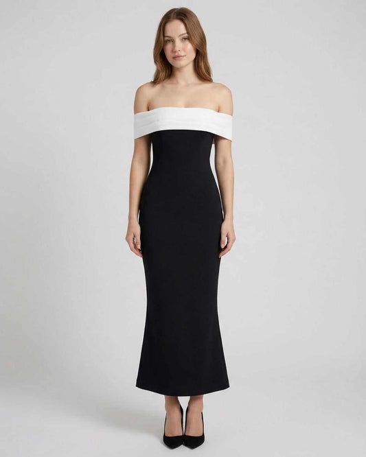 Celeste Maxi Dress by Lauven features an elegant off-shoulder silhouette in black and white, offering timeless sophistication.