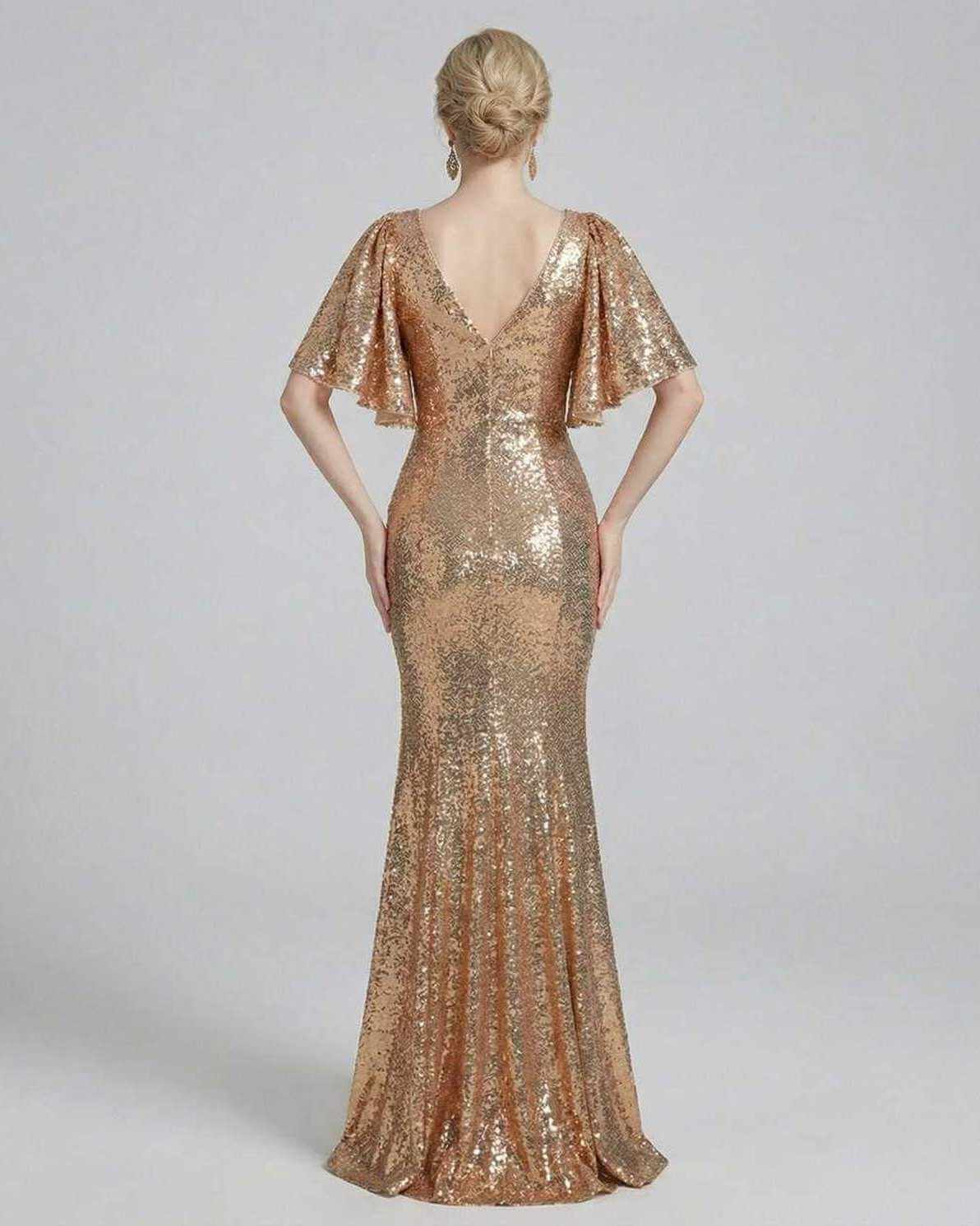 Back view of Celeste Maxi Dress by Lauven, showcasing its elegant sequined design and stunning gold tone.