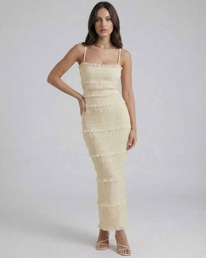 Celeste Maxi Dress by Lauven, elegant ivory dress with spaghetti straps and textured detailing for special occasions.