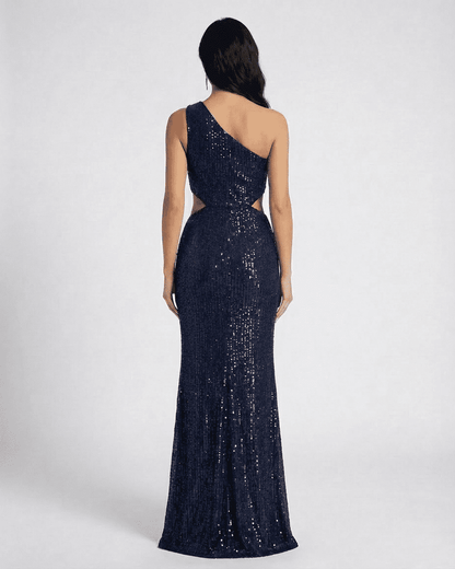 Back view of SLIMONA Celeste Maxi Dress, featuring a one-shoulder design with elegant side cutouts and sequin embellishments.