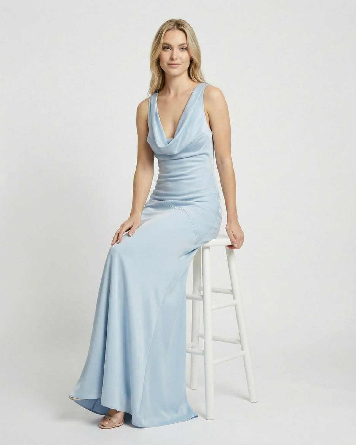 Celeste Maxi Dress by SLIMONA featuring a satin-effect cowl neck design, showcased in a light blue color.