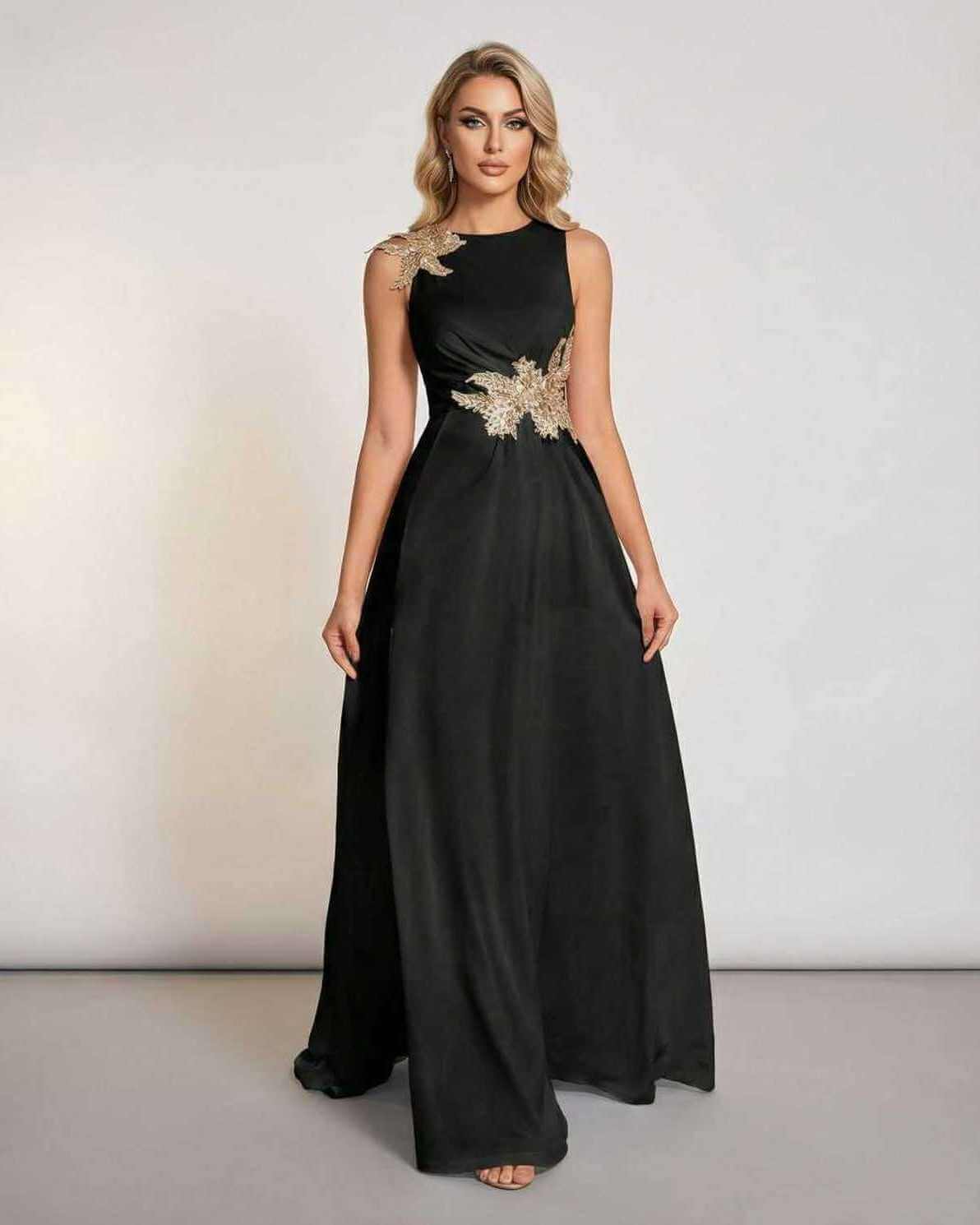 Celeste Maxi Dress by Lauven - Elegant sleeveless black maxi dress with patchwork detail and flowing silhouette.