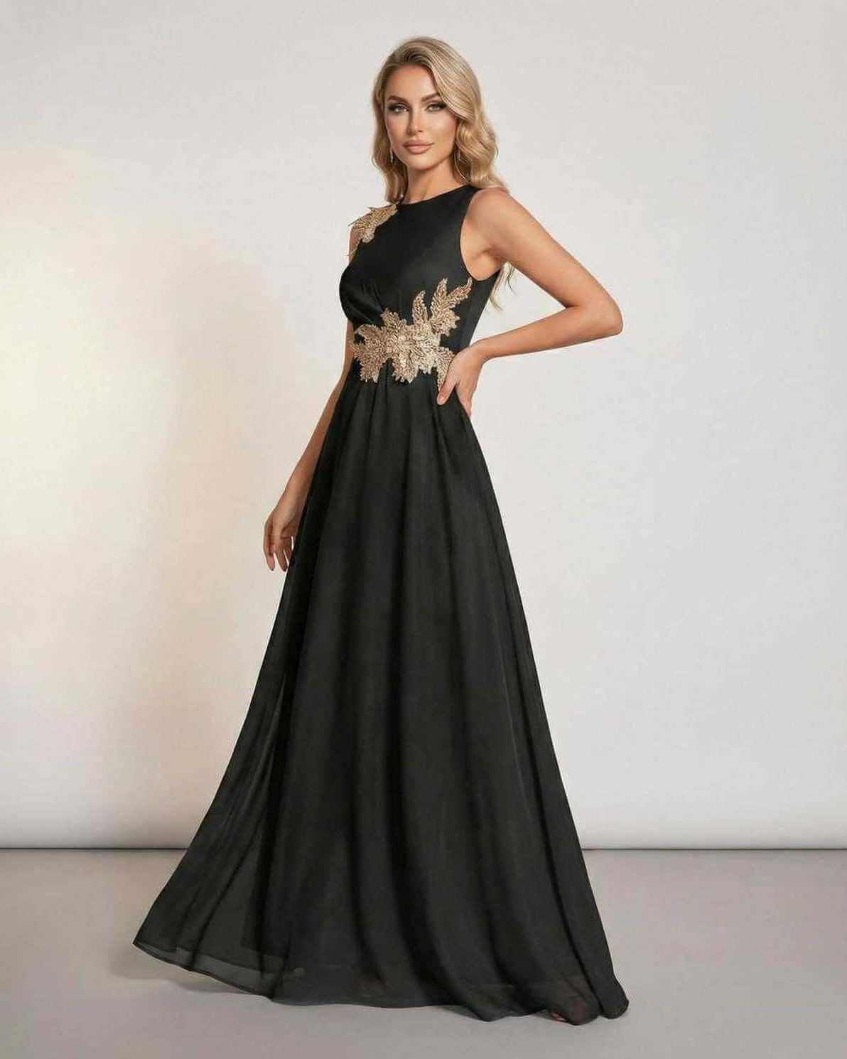 Celeste Maxi Dress by Lauven, featuring a sleeveless black design with elegant patchwork detail and flowing silhouette.