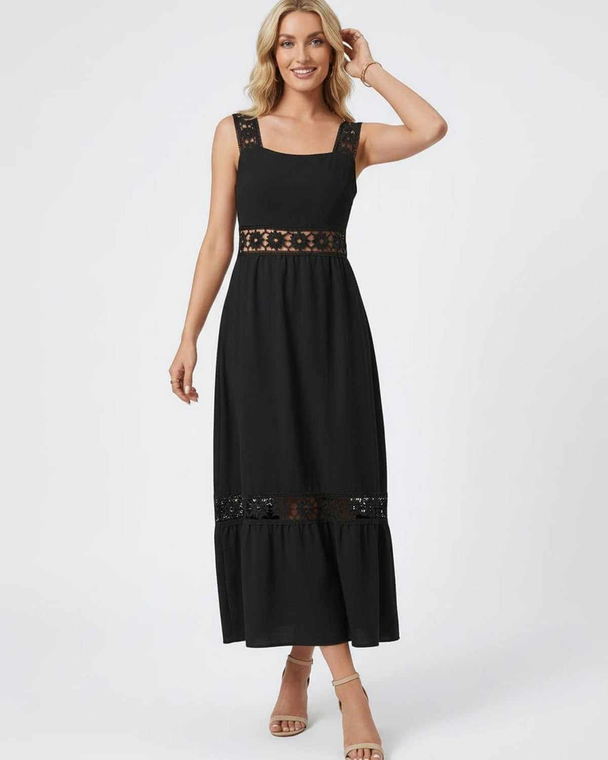 Lauven Celeste Midi Dress featuring elegant lace insets on a chic black design, perfect for modern fashion trends.