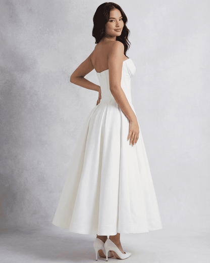 Celeste Midi Dress by SLIMONA, elegant strapless corset A-line design, showcasing a graceful silhouette.