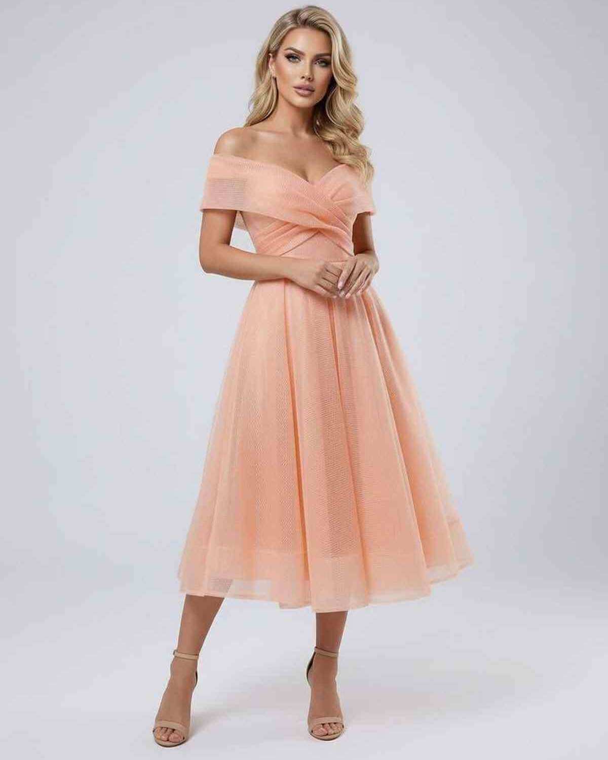 Celeste Midi Dress by Lauven, an elegant off shoulder dress in soft peach hue, perfect for special occasions.