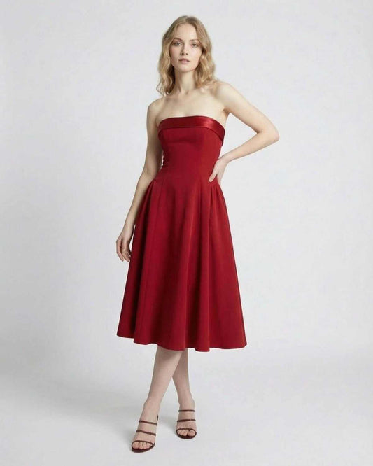 Celeste Midi Dress by SLIMONA, elegant strapless high-waist silhouette in red with pockets.