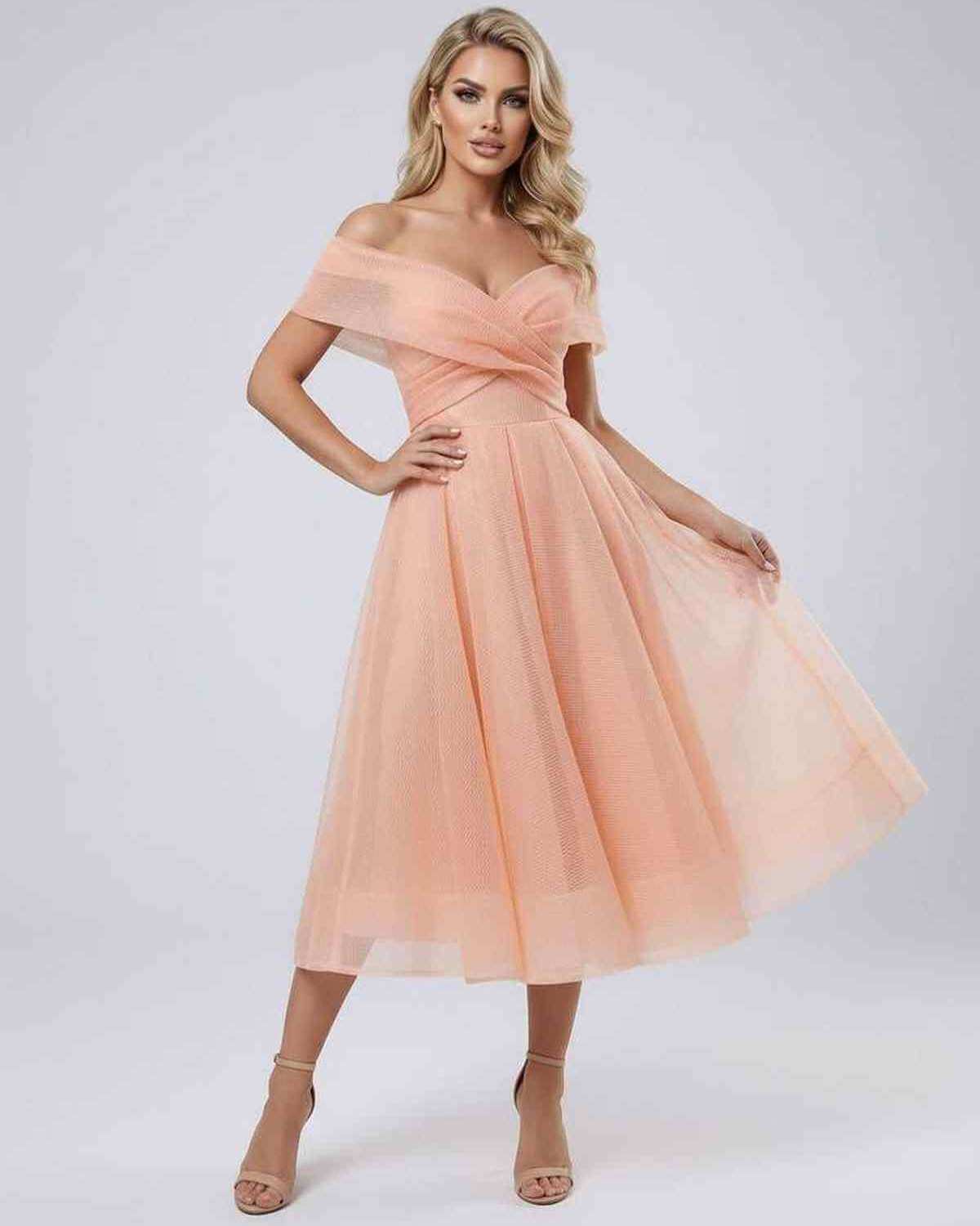 Celeste Midi Dress by Lauven in soft peach, showcasing an elegant off shoulder design perfect for special occasions.