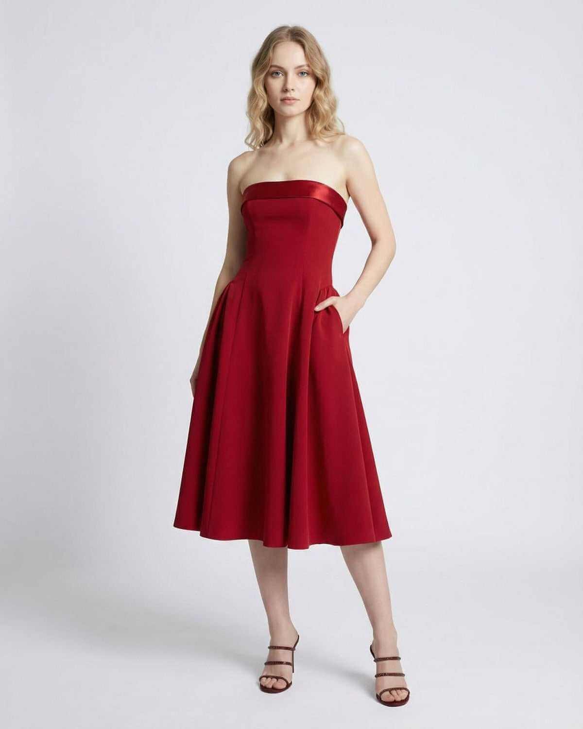 Celeste Midi Dress by SLIMONA - Strapless high-waist midi silhouette in elegant red with pockets.