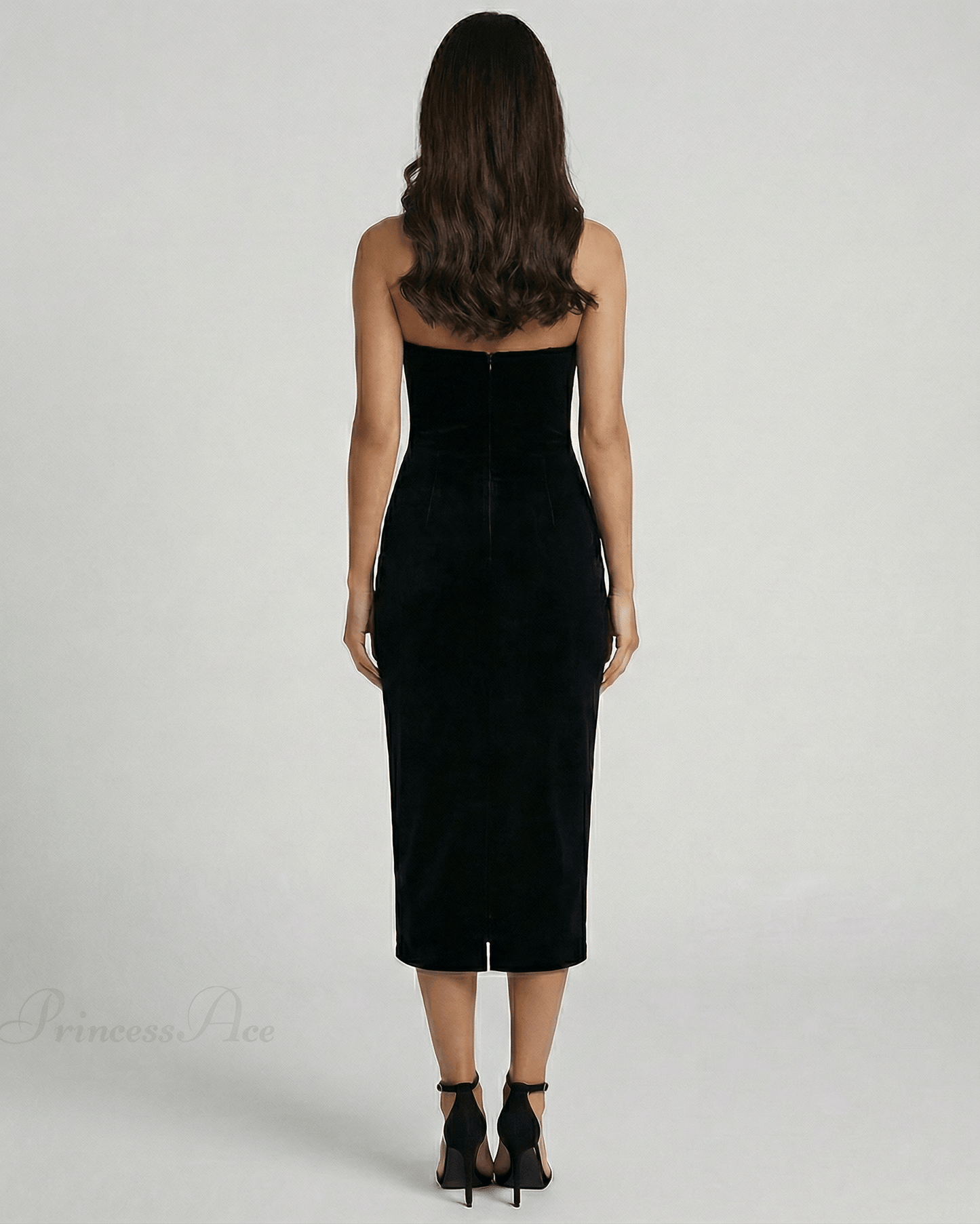 Celeste Midi Dress by Lauven, showcasing a sleek strapless design in a black sheath style from the back view.